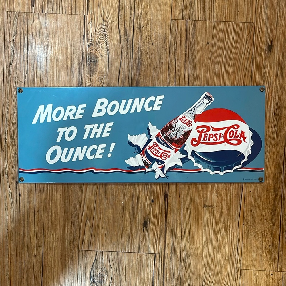 Vintage Pepsi Cola sign.